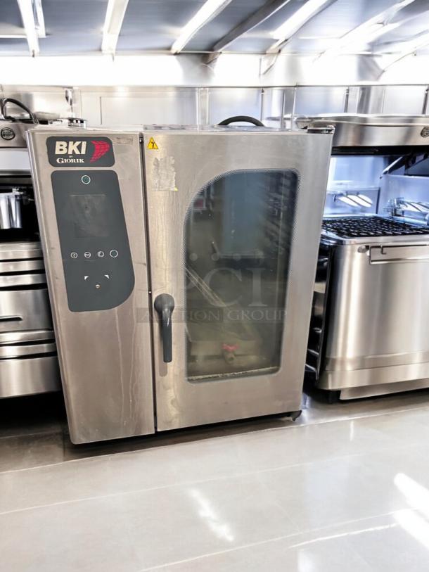 Brand new BKI Giorik ABTE101R electric combi oven, 208V 3PH, fully tested, stainless steel finish, visible control panel.