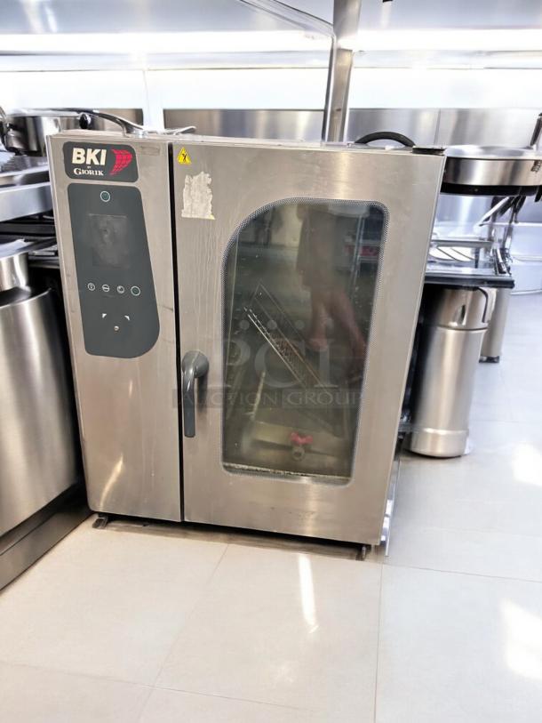 Brand new BKI Giorik ABTE101R electric combi oven, 208V 3PH, fully tested, stainless steel, visible logo and control panel.