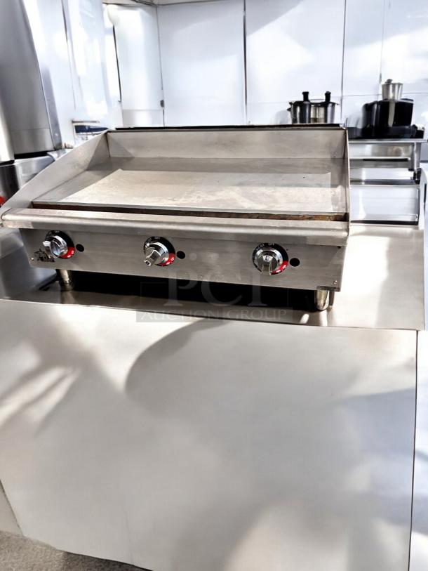 Star Max 624TF 24" gas griddle in superb condition, manual controls, fully tested, operational, stainless steel.