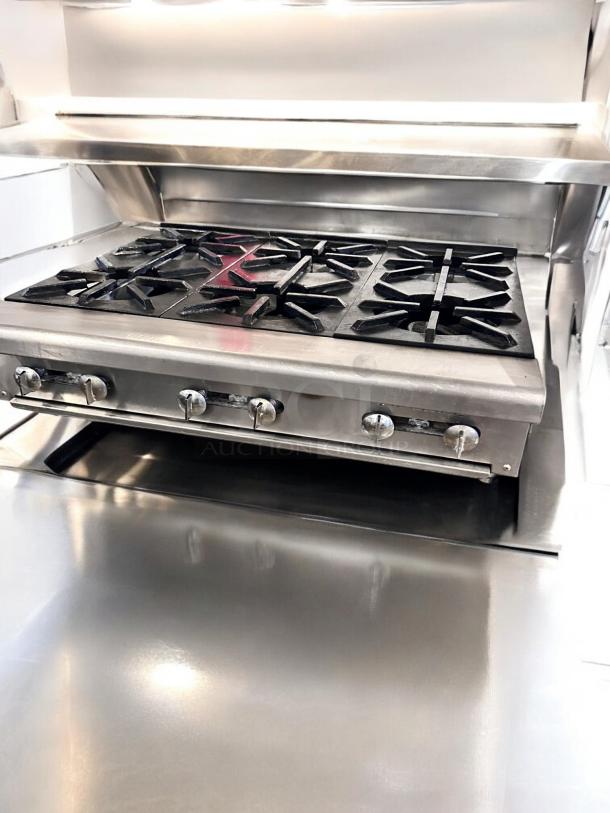 Imperial 6-burner gas range, excellent condition, heavy-duty stainless steel, fully tested and working, visible control knobs.