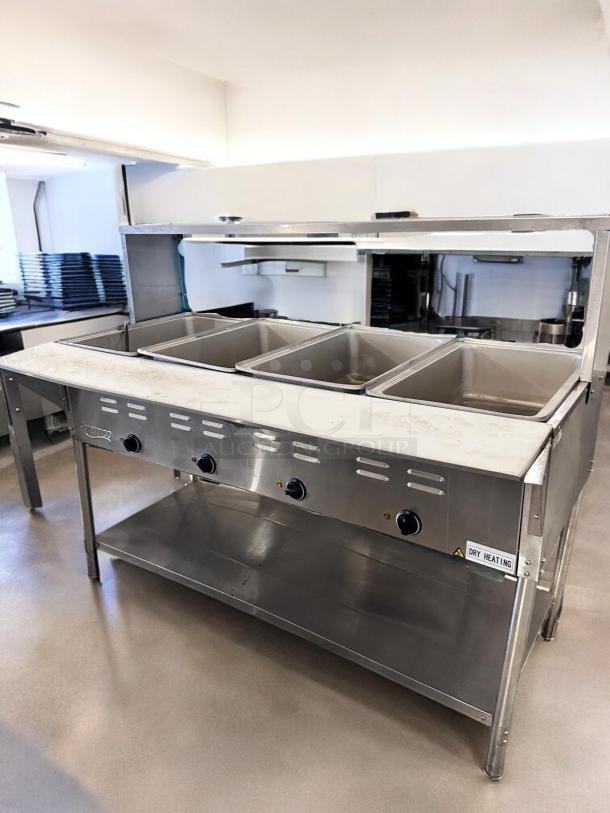 Avantco 177STE45A 4-pan electric steam table in excellent condition, 120V, fully tested, featuring durable stainless steel.