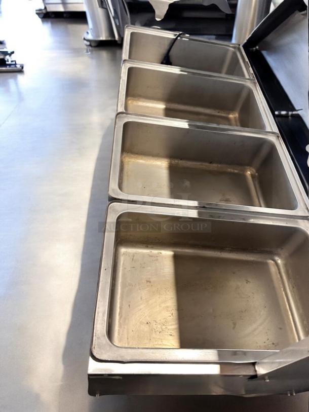 Avantco 177STE45A 4-Pan Electric Steam Table, excellent condition, 120V, fully tested, stainless steel pans visible.