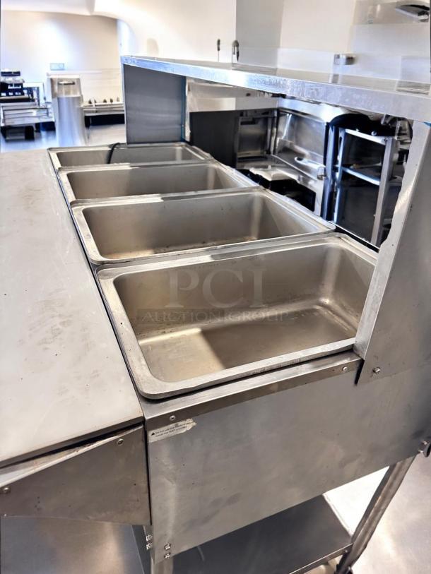 Avantco 177STE45A 4-pan electric steam table in excellent condition, 120V, fully tested, stainless steel construction.