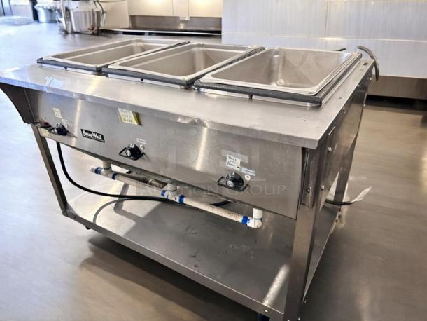 Pristine ServeWell SRP12 4-pan steam table in stainless steel, 120V, fully tested and working, brand logo and controls visible.