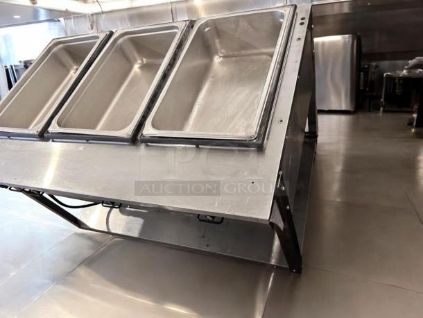 ServeWell SRP12 steam table, pristine condition, 4-pan capacity, 120V, fully tested, stainless steel construction.