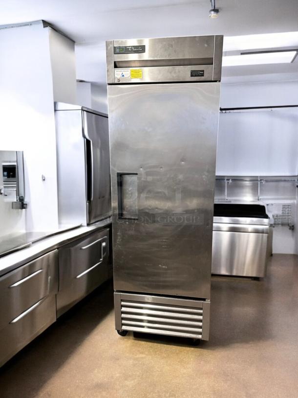 True T-23F-HC single door reach-in freezer in outstanding condition, 115V, fully tested. Silver finish, True branding visible.