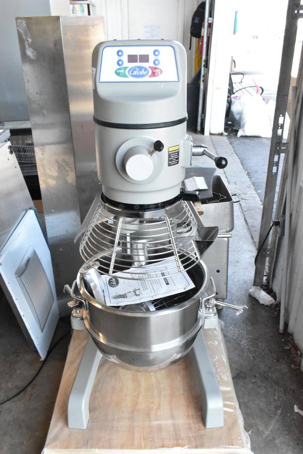 Brand new Globe SP30 commercial 30-quart dough mixer, includes mixing bowl, bowl guard, attachments; 115V, 1 phase.
