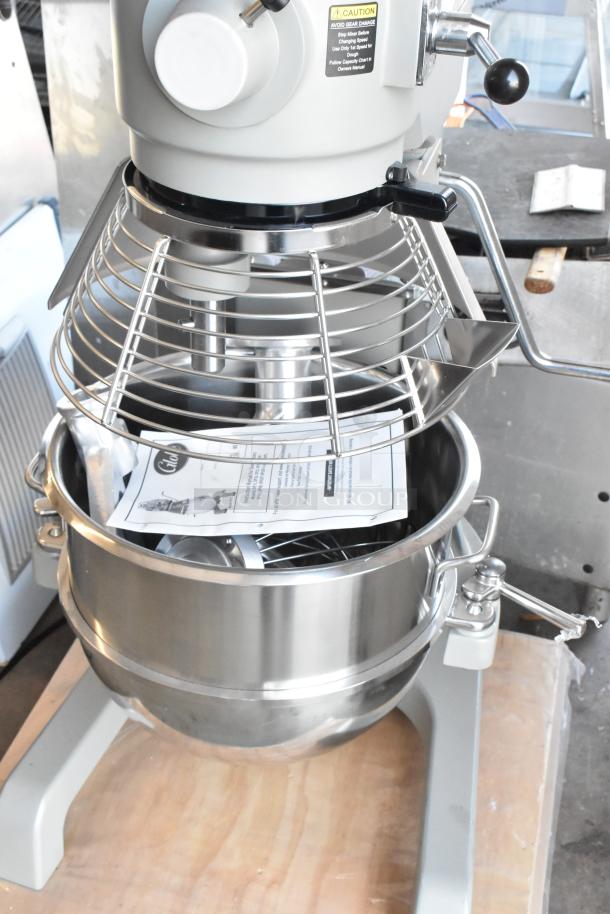 Brand new 2024 Globe SP30 commercial 30-quart planetary dough mixer with mixing bowl, bowl guard, and attachments. 115V, 1 Phase.