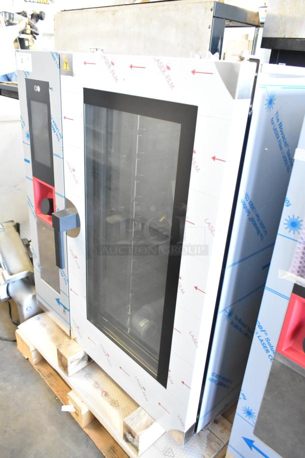 BRAND NEW Bakers Pride AETG101R stainless steel commercial gas combi convection oven, factory protective film intact.
