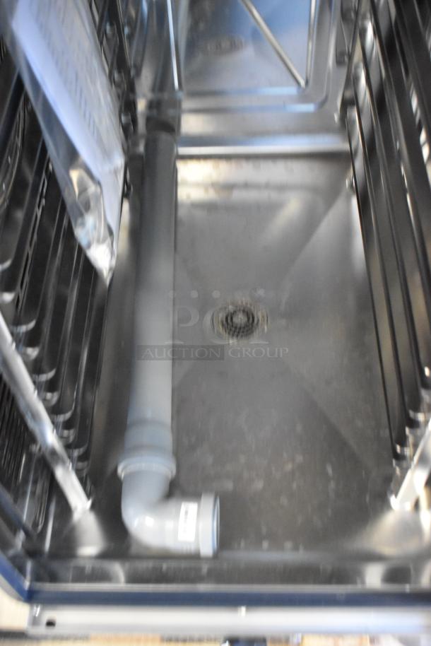 BRAND NEW Bakers Pride AETG101R stainless steel commercial combi convection oven interior, natural gas powered.