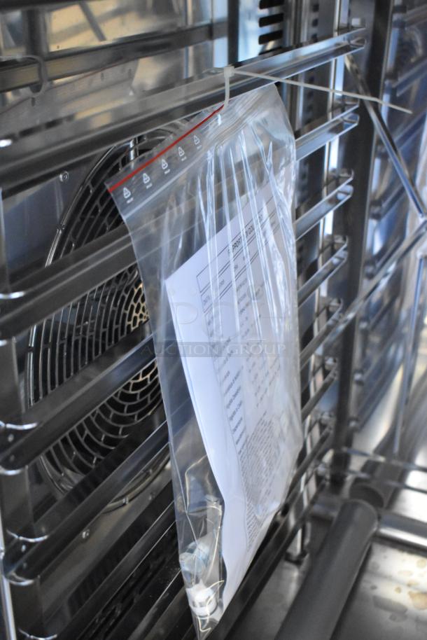 Brand new Bakers Pride AETG101R stainless steel commercial combi convection oven, natural gas powered, includes manual.