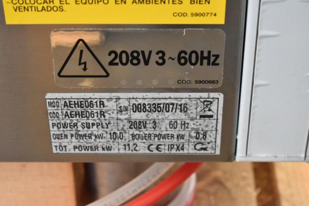Bakers Pride AEHE061R stainless steel electric combi convection oven, 208V, 3 phase, brand new condition, model label visible.