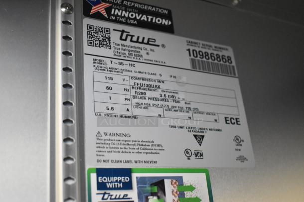 "True T-35-HC label with specifications: 115V, R290 refrigerant, model details, NSF/ANSI standard, and warning notice."