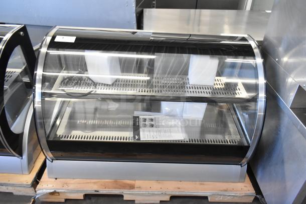 Brand new Vollrath RDE8148 48" curved glass refrigerated display cabinet, 120V, 1 phase, pristine condition.