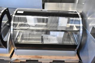 Brand new Vollrath RDE8148 48" curved glass refrigerated display cabinet, 120V, 1 phase, pristine condition.