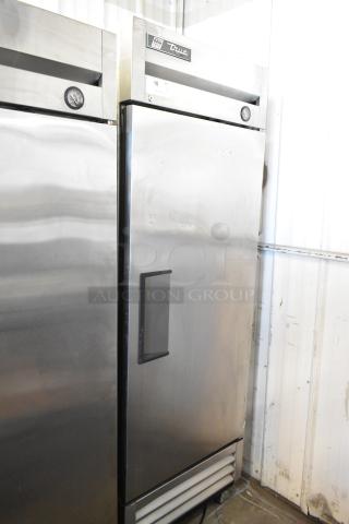 2017 True T-19F stainless steel commercial freezer, single door, poly coated racks, on casters, 115 volts, 1 phase.