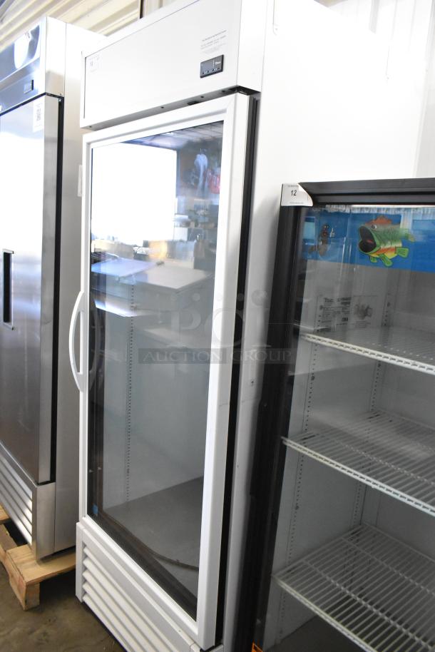 2020 True TSCI-600R-G-PH single door commercial cooler, glass front, 115V, 1 Phase. Clean, metal exterior.