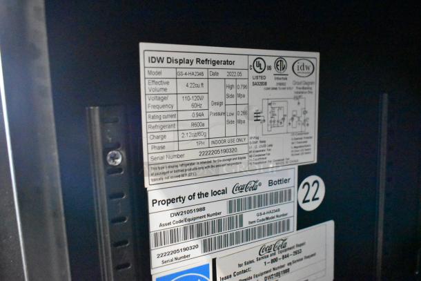 IDW GS-4-HA234B label shows model, voltage, refrigerant, and serial number. Used in commercial coolers.
