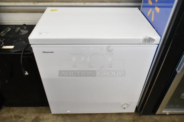 Hisense WFC070M6RWD metal chest freezer, white, hinge lid, 115 volts, 1 phase, clean condition, visible control knob.