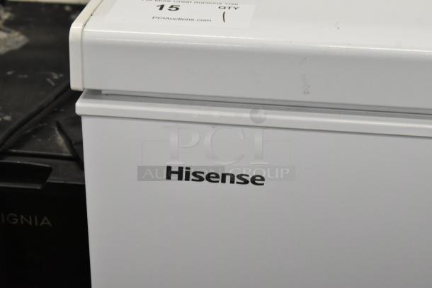 Hisense WFC070M6RWD metal chest freezer with hinge lid, in good condition, 115 volts, 1 phase, visible Hisense logo.