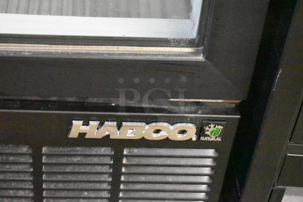 2019 Habco SE18 single door cooler, metal exterior, with poly-coated racks. Features Habco logo and "Natural" marking.