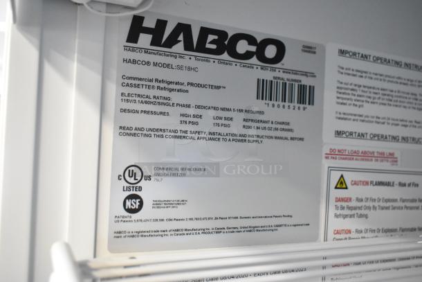 2019 Habco SE18 single door cooler with poly racks, 115V, 1 phase, listed and NSF certified. Label shows model specs.