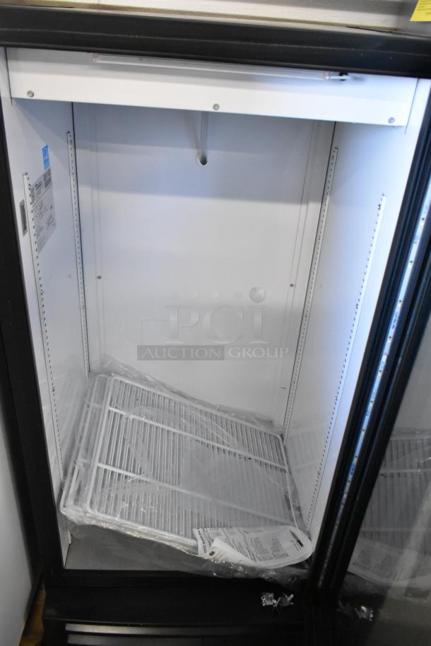 2017 True GDM-10-HC-LD commercial cooler, single door, poly-coated racks, 115 volts, 1 phase. Clean interior, white finish.