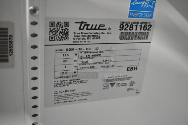 2017 True GDM-10-HC-LD cooler label, 115V, Energy Star certified. Shows model, refrigerant details, and warnings.