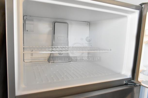 Brand new Whirlpool WRT311FZDM05 stainless steel freezer interior; single shelf, 115 volts, 1 phase, scratch and dent.