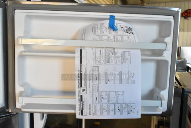 New Whirlpool WRT311FZDM05 stainless steel fridge with freezer, 115V, 1-phase. Installation instructions attached inside.