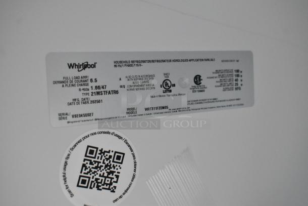 Label of Whirlpool WRT311FZDM05 stainless steel cooler with freezer, 115V. Details include model, serial number VSE0455927.
