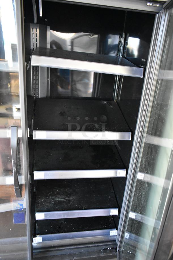 2022 True TVM-48SL-HC 2 Door Reach-In Cooler, metal shelves, commercial use, 115V, 1 phase, clean interior, visible label.
