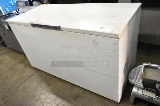 Bradford 61168 metal chest freezer with hinge lid. Visible wear, 115 volts, 1 phase.