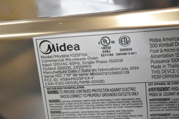 2024 Midea 1025FOA stainless steel commercial countertop microwave oven, 115V, 1 phase, 2450MHz. Manufacture date: July 2024.