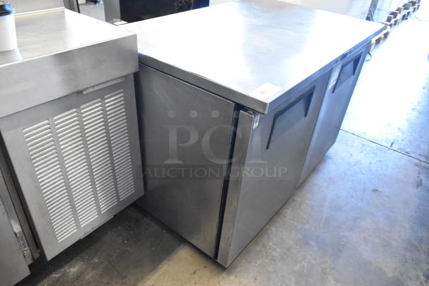 True TUC-48F-LP stainless steel undercounter freezer with two doors, on commercial casters, 115V, 1 phase.