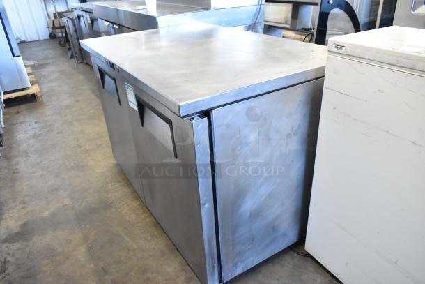 True TUC-48F-LP stainless steel 2-door undercounter freezer on casters. Commercial grade, 115V, 1-phase. Good condition.