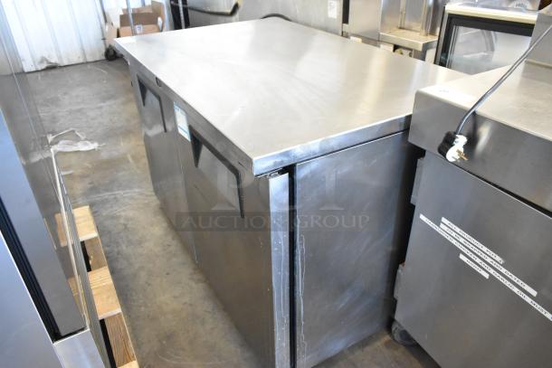 True TUC-48F-LP stainless steel undercounter freezer, 2-door, on commercial casters, 115V, 1 phase, in good condition.