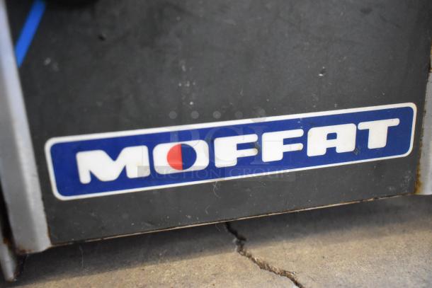 Moffat Turbofan E32MS convection oven label, showing brand logo in blue and white on stainless steel appliance.