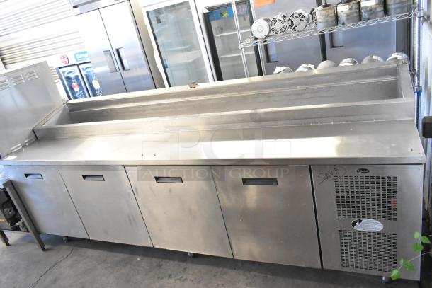 Randell 84111NM stainless steel pizza prep table, 115 volts, 1 phase, commercial use, with storage and refrigeration.