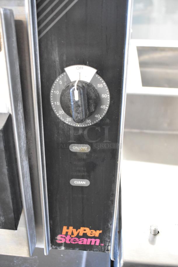 Groen HY-6G HyPer Steam Stainless Steel 2 Deck Steam Cabinet. Features control panel with timing dial, on/off, and clean buttons.