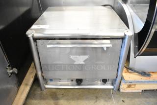 Bakers Pride MOS2E stainless steel commercial countertop electric pizza oven; visible wear, broken cooking stones; 208/240V.
