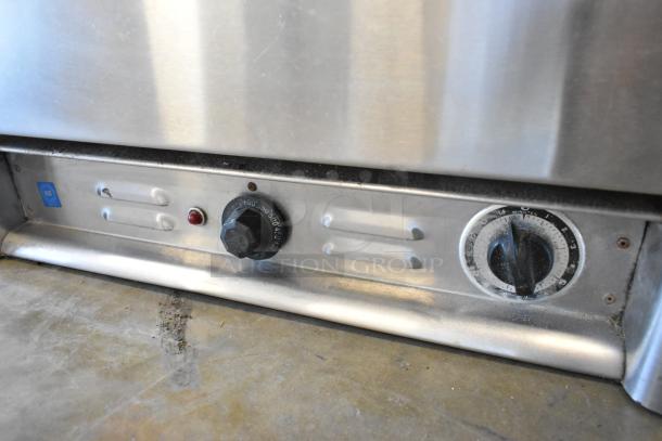 Bakers Pride MOS2E stainless steel commercial pizza oven with broken cooking stones. Electric powered. 208/240 volts.