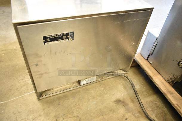 Bakers Pride MOS2E stainless steel pizza oven, commercial countertop model, electric-powered. Features broken cooking stones. 208/240V.