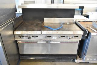 Garland metal commercial gas griddle with two sections, dual ovens, overhead shelf, backsplash, and visible wear.