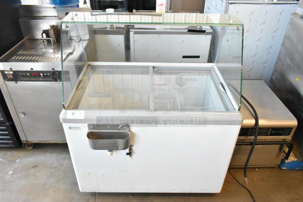 Excellence HL-11HC metal ice cream dipping cabinet with dipwell, 115 volts, 1 phase. Features glass top and dual sections.