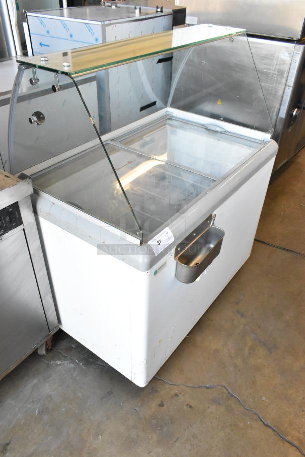 Excellence HL-11HC ice cream dipping cabinet with glass top and dipwell. 115V, 1 Phase. Used condition.