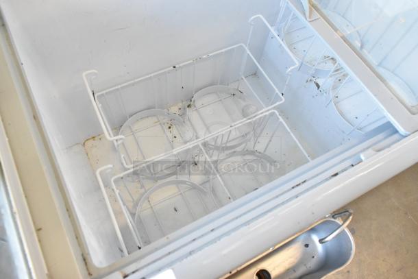 Excellence HL-11HC ice cream dipping cabinet with dipwell, showing interior racks. Minor wear visible, 115 Volts, 1 Phase.