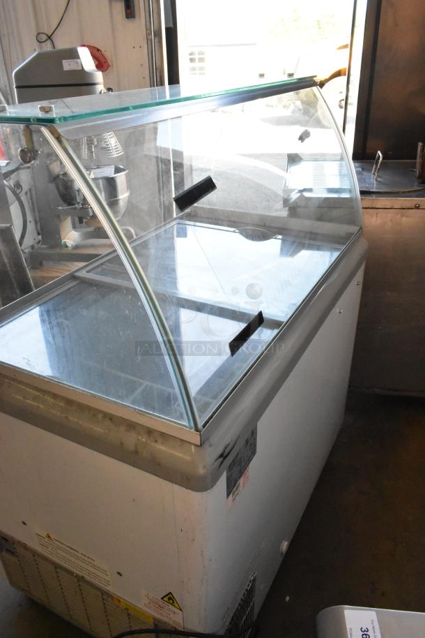 Excellence HL-11HC Metal Ice Cream Dipping Cabinet with Dipwell, glass display, 115 volts, 1 phase, visible wear marks.
