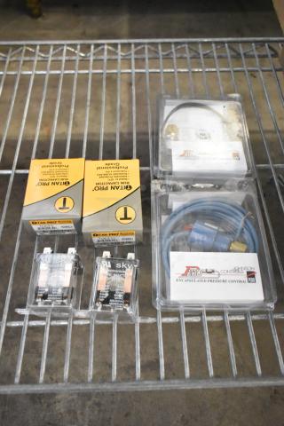 Lot of items including encapsulated pressure control kit by Johnson Controls and Titan Pro run capacitors. New condition.