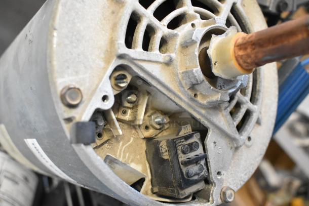 2 Motors: Marathon WG55T8O15516A and US Motors J63WZBKH-0246, 208-230/460V, 3 Phase. Used condition, visible wiring terminals.